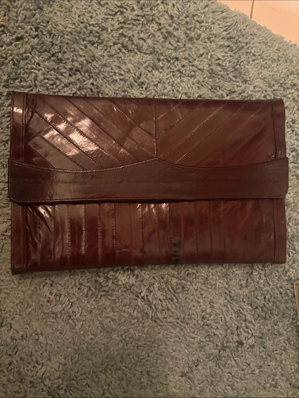Vintage EEl skin clutch handbag